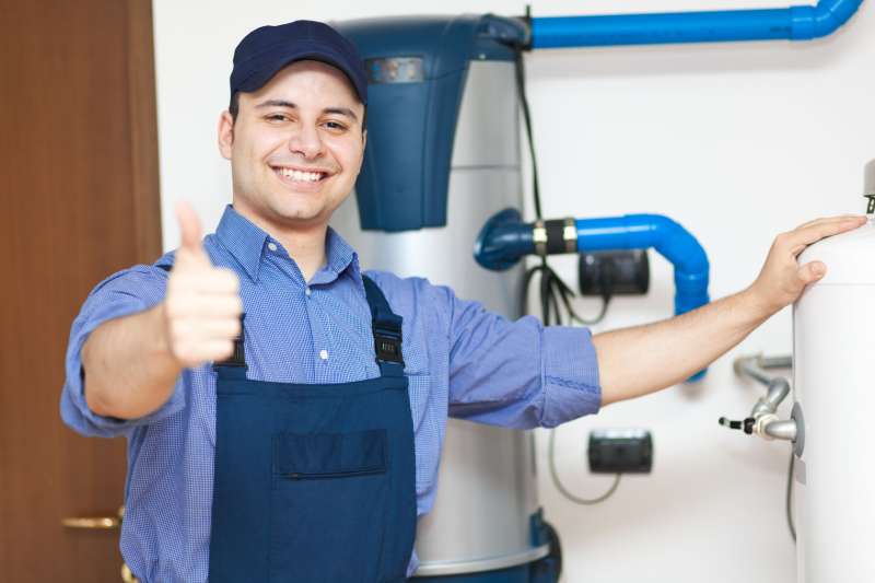 Greywater system integration with water heating